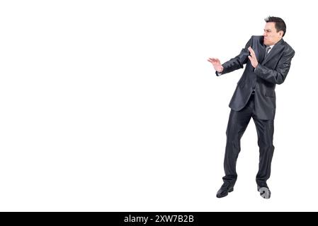 Angewiderter Mann in elegantem Anzug. Weißer Hintergrund. Stockfoto