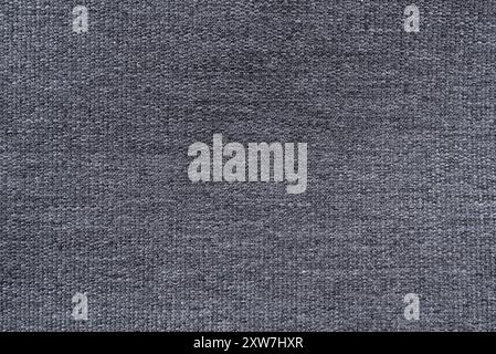 Textur aus schwarzem oder grauem Stoff zum Nähen von Kleidung. Textil. Gestreiftes Material Stockfoto