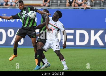 Leuven, Belgien. August 2024. Cercle's Lawrence Agyekum, Cercle's Flavio Nazinho und OHL's Ignace Ndri wurden während eines Fußballspiels zwischen OH Leuven und Cercle Brugge am Sonntag, den 18. August 2024 in Leuven am vierten Tag der Saison 2024-2025 der ersten Liga der belgischen Meisterschaft gezeigt. BELGA FOTO JILL DELSAUX Credit: Belga News Agency/Alamy Live News Stockfoto