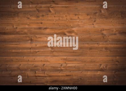 Braune Holzhintergrundstruktur, die die Holzmaserung hervorhebt. Natürliche rustikale Kulisse mit einer Oberfläche aus Holzlatten. Stockfoto