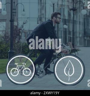 Green Ride. Seitenansicht eines jungen Geschäftsmannes, der auf seinem Fahrrad nach vorne blickt Stockfoto