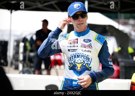 Richmond, Va, USA. August 2024. Ben Rhodes läuft an seinem Auto vorbei, bevor er sich für den Clean Harbors 250 in Richmond, VA, USA, qualifiziert. (Kreditbild: © Walter G. Arce Sr./ASP via ZUMA Press Wire) NUR REDAKTIONELLE VERWENDUNG! Nicht für kommerzielle ZWECKE! Stockfoto