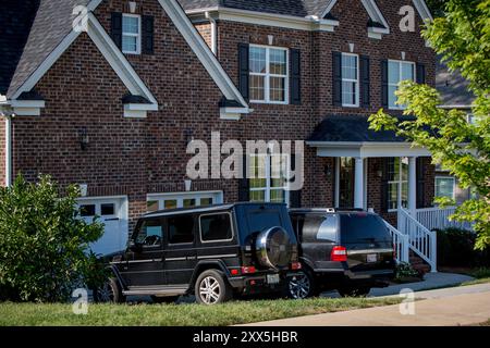 Josteins Florida-registrierter Mercedes Gelandewagen står parkert utenfor et av husene Alevo kjøpte i boligfeltet Laurel Park rett ved Philip Morris-fabrikken der Alevo holdt til. Stockfoto