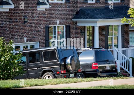 Josteins Florida-registrierter Mercedes Gelandewagen står parkert utenfor et av husene Alevo kjøpte i boligfeltet Laurel Park rett ved Philip Morris-fabrikken der Alevo holdt til. Stockfoto