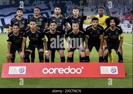 AL SADD SC gegen AL ARABI SC-OOREDOO STARS LEAGUE QATAR Al Sadd SC Spieler posieren für ein Teamfoto vor dem Spiel der Ooredoo Stars League 24/25 zwischen Al-Sadd SC und Al-Arabi SC am 22. August 2024 im Jassim bin Hamad Stadium in Doha, Katar. DOHA Katar Copyright: XNOUSHADx Stockfoto