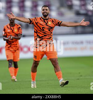 AL-DUHAIL SC - UMM SALAL SC-OOREDOO SPIELT DIE LIGA QATAR Oussama Tannane von Umm Salal SC in Aktion während des Spiels der Ooredoo Qatar Stars League 24/25 zwischen Al-Duhail SC und Umm Salal SC im Khalifa International Stadium in Doha, Katar, am 22. August 2024. DOHA Katar Copyright: XNOUSHADx Stockfoto