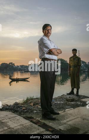 Ein meter se Niveau steigen werden 20 Prozent unseres Landes unter Wasser gesetzt, sagt Klimaforscher Mozaharul Alam. Hier ist er neben dem allumfassenden Wasser in der Hauptstadt Dhaka. Bangladesch ist anfällig für die hochwasserwellen von Überschwemmungen und Dürre, die durch das Abschmelzen der Gletscher des Himalaya verursacht. Stockfoto