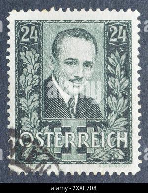 Gestempelte Briefmarke, gedruckt von Österreich, die an die Ermordung von Dollfuss, Dr. Engelbert, um 1935 erinnert. Stockfoto