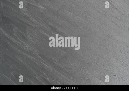 Sapphire Metallic Sahara Wandbeschichtung mit strukturiertem Farbmuster grau-schwarze dekorative Beschichtung Stockfoto