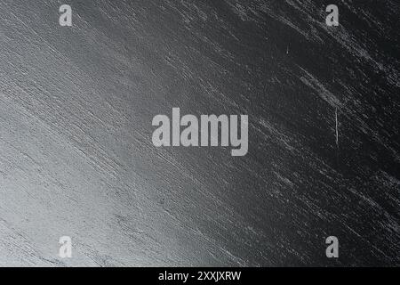 Sapphire Metallic Sahara Wandbeschichtung mit strukturiertem Farbmuster grau-schwarze dekorative Beschichtung Stockfoto