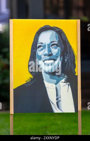 2024 Schild für die US-Präsidentschaftswahl mit einem Porträt-Gemälde, das Vizepräsidentin Kamala Harris darstellt Stockfoto