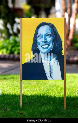 2024 Schild für die US-Präsidentschaftswahl mit einem Porträt-Gemälde, das Vizepräsidentin Kamala Harris darstellt Stockfoto