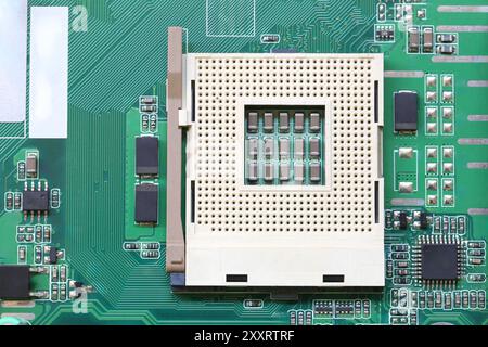 Leerer CPU-Sockel auf dem Hauptplatinenhintergrund für Design in Ihrem Arbeitscomputer-Konzept. Stockfoto