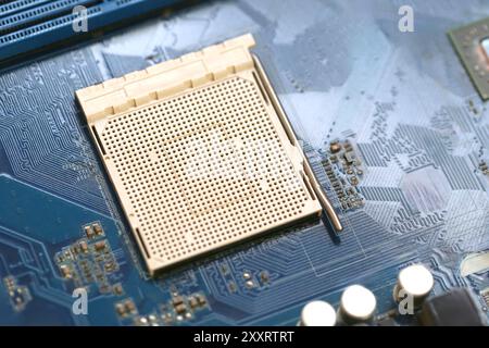 Leerer CPU-Sockel auf dem Hauptplatinenhintergrund für Design in Ihrem Arbeitscomputer-Konzept. Stockfoto