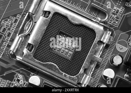 Leerer CPU-Sockel auf dem Hauptplatinenhintergrund für Design in Ihrem Arbeitscomputer-Konzept. Stockfoto