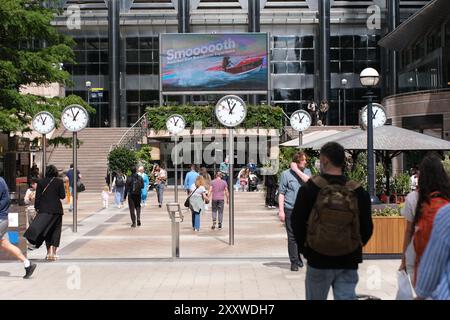Reuters Plaza und Uhren, Canary Wharf, London Stockfoto