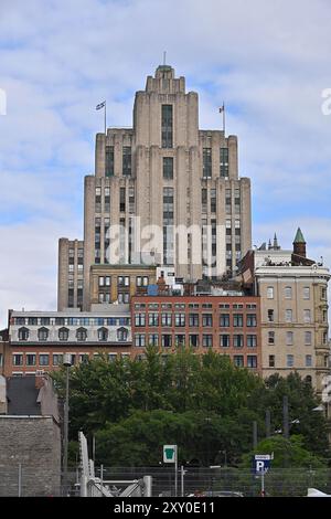 Kanada, Québec, Montreal: Das Aldred Building, ein Art déco-Gebäude auf dem historischen Platz „Place d'Armes“, einem der ersten modernen Wolkenkratzer der Stadt Stockfoto