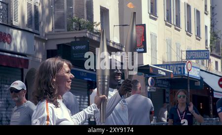 Die Pariser Paralympics Flamme in Pigalle Stockfoto