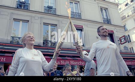 Die Pariser Paralympics Flamme in Pigalle Stockfoto