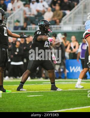 24. August 2024: Daniel Williams #69, Verteidiger der Hawaii Rainbow Warriors, steht während des NCAA-Fußballspiels zwischen den Delaware State Hornets und den University of Hawaii Rainbow Warriors bei Clarence T.C. ChingComplex in Honolulu, Hawaii. Glenn Yoza/CSM Stockfoto