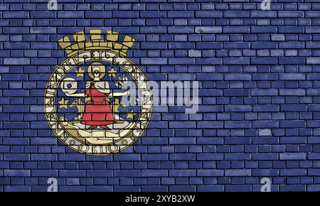 Die Flagge von Oslo ist auf einer Ziegelwand gemalt Stockfoto