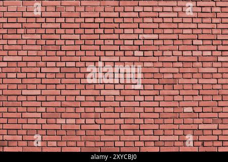 Pfirsich Echo farbige Ziegel Wand Hintergrund Stockfoto