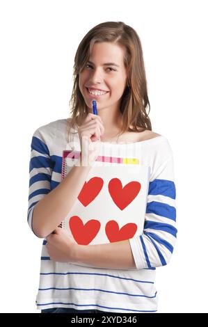 Junge Frau mit Notebooks auf dem Arm Stockfoto