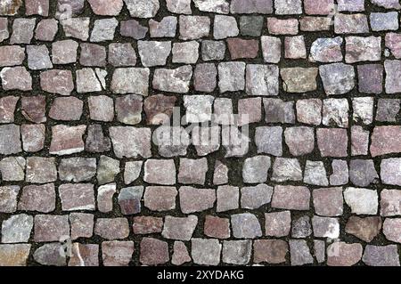 Straßenhintergrund für Pflastersteine Stockfoto