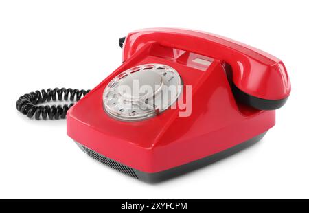 Ein rotes Telefon mit lokalisiertem Mobilteil auf weiß Stockfoto