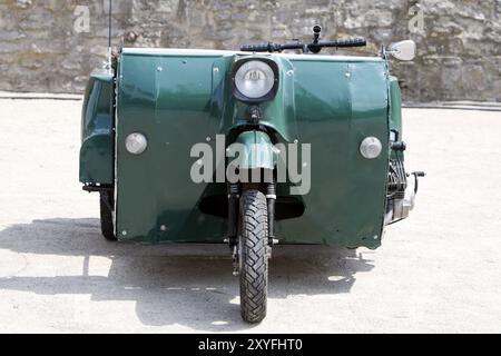 Selbstgemachte grüne Moped-Marke Stockfoto