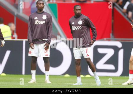 Amsterdam, Niederlande. August 2024. AMSTERDAM, 29.08.2024, JohanCruyff Arena, Europa League Play offs, Saison 2024/2025, Ajax-Jagiellonia Bialystok. Carlos Forbs (R) Credit: Pro Shots/Alamy Live News Stockfoto