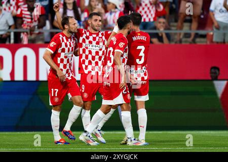 Girona, Spanien. August 2024. Abel Ruiz (Girona FC) feiert, nachdem er am 29. August 2024 im Montilivi-Stadion in Girona, Spanien, beim Fußballspiel La Liga zwischen Girona FC und CA Osasuna mit seinen Teamkollegen einen Treffer erzielt hat. Foto: Siu Wu Credit: dpa/Alamy Live News Stockfoto