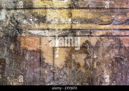 Altes Mauerwerk mit verblassten Farben als Hintergrund Stockfoto