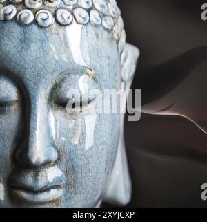 Buddha "schließen" Porträt über dunklen Hintergrund Stockfoto