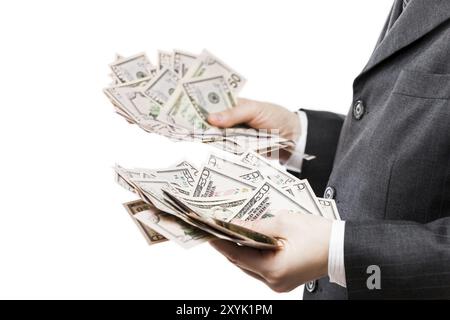 Business Success Concept, Geschäftsmann in schwarzem Anzug, der Geld in US-Dollar hält Stockfoto