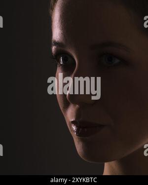 Eine junge Frau Gesicht in Nahaufnahme Stockfoto