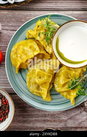 Gekochte Manti mit Fleisch. Usbekische Küche. Stockfoto