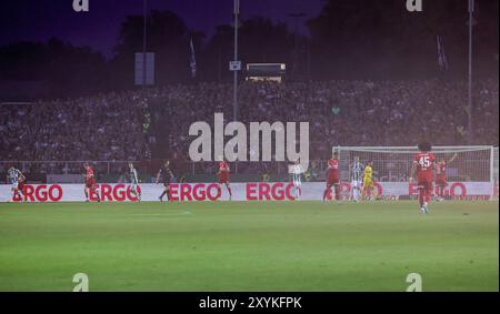 Münster, Deutschland. August 2024. firo: 27.08.2024, Fußball, DFB-Pokal, Pokal, Saison 2024/2025, 1. Runde, SCP Preussen Münster - VfB Stuttgart 0,5 ergo Werbebanner Credit: dpa/Alamy Live News Stockfoto