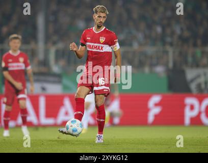 Münster, Deutschland. August 2024. firo: 27.08.2024, Fußball, DFB-Pokal, Pokal, Saison 2024/2025, 1. Runde, SCP Preussen Münster - VfB Stuttgart 0,5 Atakan Karazor, Einzelaktion, SCP/dpa/Alamy Live News Stockfoto