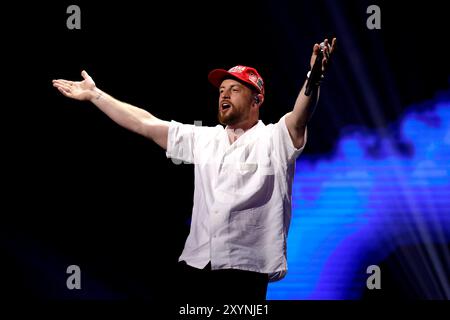 Rapper Bausa bei der Aufzeichnung der Sonderausgabe der ProSieben Fernsehsendung TV Total XXL in der Lanxess Arena. Köln, 29.08.2024 NRW Deutschland *** Rapper Bausa bei der Aufnahme der Sonderausgabe der ProSieben TV-Sendung TV Total XXL in der Lanxess Arena Köln, 29 08 2024 NRW Deutschland Copyright: XChristophxHardtx Stockfoto