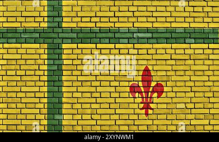Flagge von Fransaskois auf Ziegelwand gemalt Stockfoto