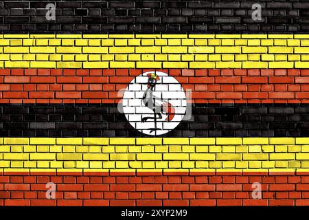 Flagge Uganda auf Stein Wand gemalt Stockfoto