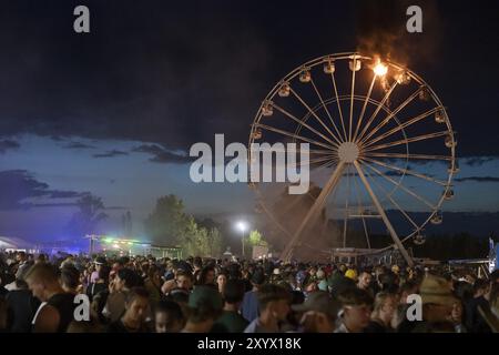 Riesenrad fängt Feuer beim Highfield Festival am Freitag, Stoermthaler See, 17.08.2024 Stockfoto