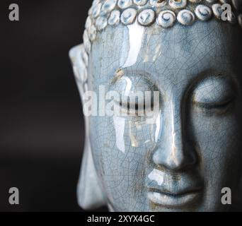 Buddha "schließen" Porträt über schwarz baground Stockfoto