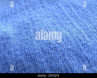 Blauer Jeansstoff in Großansicht Stockfoto