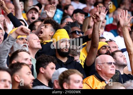 Nottingham, Großbritannien. 31. August 2024. Fans der Wolverhampton Wanderers während des Spiels Nottingham Forest FC gegen Wolverhampton Wanderers FC English Premier League im City Ground, Nottingham, England, Großbritannien am 31. August 2024 Credit: Every Second Media/Alamy Live News Stockfoto