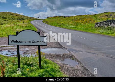 Willkommen in Cumbria Schild auf der B6276, die Lunedale, County Durham/Cumbria Grenze verlassen Stockfoto