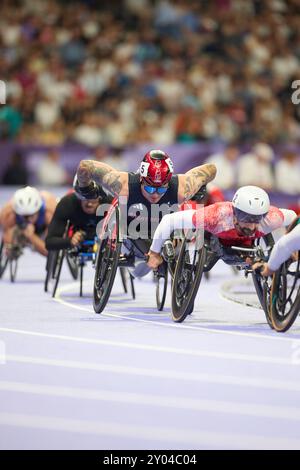 Paris, Frankreich. 31. August 2024, Paris, Frankreich. Para Athletics Herren 5000 m - T54 Finale im Stade de France. Daniel ROMANCHUK aus den USA, Marcel HUG aus der Schweiz, Faisal ALRAJEHI aus Kuwait, MA Zhuo aus China, Saichon KONJEN aus Thailand, Xingchuan LUO aus China, Brent LAKATOS aus Kanada, David WEIR aus Großbritannien, Brian SIEMANN aus den USA und Putharet KHONGRAK aus Thailand. Am 3. Tag der Paralympischen Spiele 2024 in Paris. Credit Roger Bool / Alamy Live News Stockfoto