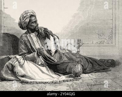 Jemenitischer Dolmetscher man bekannt als Ismael rauchend a Shisha Pipe, Jemen, Mittlerer Osten, Zeichnung von Auguste Hadamard (1823–1886) Voyage von Henri Lambert. Le Tour du Monde 1862 Stockfoto