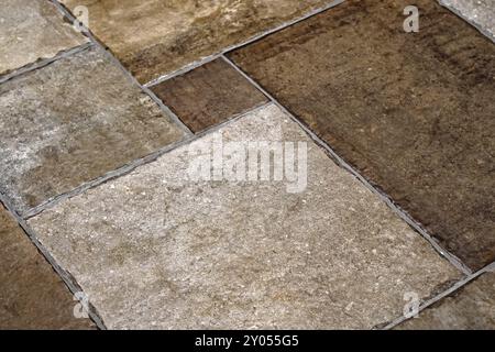 Verschiedene Größen von Bodenfliesen braun Mosaik Dekor Stockfoto